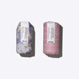 Soft, Natural, Curls Set featuring curl building serum and gel oil in patterned packaging for enhancing hair texture.