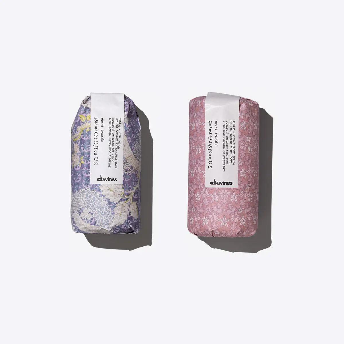 Soft, Natural, Curls Set featuring curl building serum and gel oil in patterned packaging for enhancing hair texture.