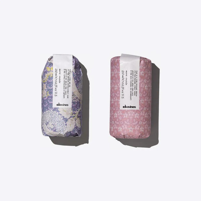 Soft, Natural, Curls Set featuring curl building serum and gel oil in patterned packaging for enhancing hair texture.