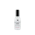 Bottle of Styling Oil Elixir for frizz control and shine enhancement, vegan and paraben-free, suitable for dry or damp hair.