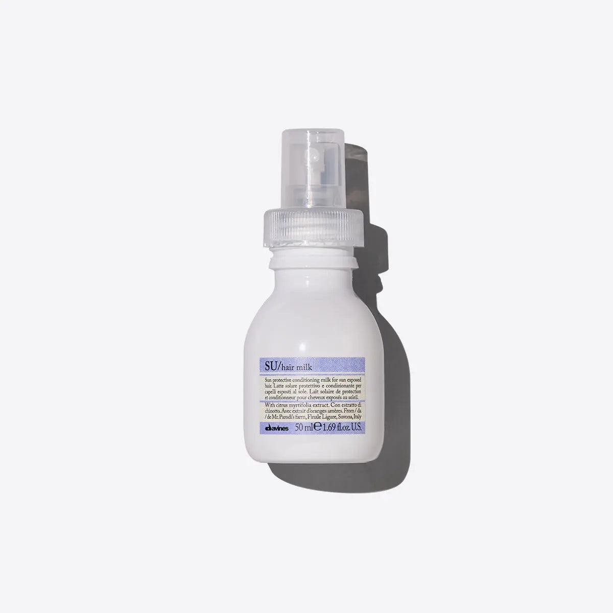 Su Milk leave-in spray cream for UV hair protection, maintains softness and color after sun exposure, 150ml bottle.