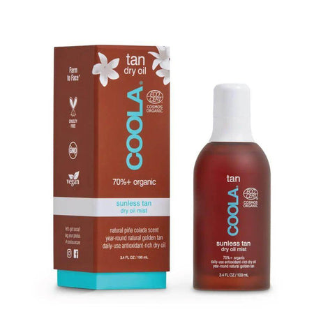 Sunless Tan Dry Oil Mist - 70% organic ingredients in a bottle with packaging, offering a natural, streak-free tan with Argan Oil and Vitamin C.