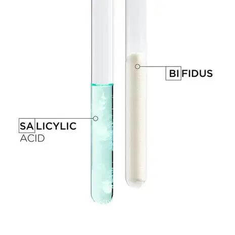 Test tubes containing salicylic acid and bifidus, key ingredients in Symbiose Sérum Nuit Intensif for hair rejuvenation and health.