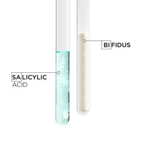 Test tubes containing salicylic acid and bifidus, ingredients in Symbiose Sérum Nuit Intensif for hair rejuvenation.