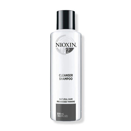 Nioxin Cleanser Shampoo System 2 for non-chemically treated, thinning hair, detoxifying and removing buildup, minerals, and pollutants.