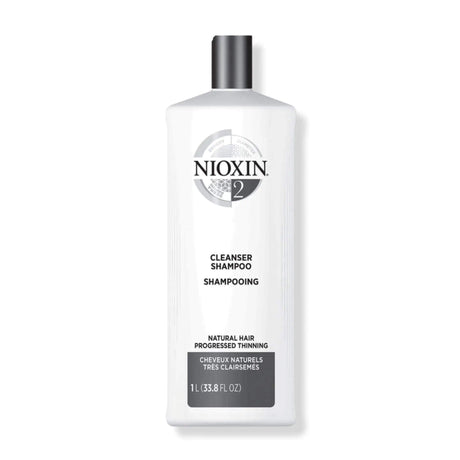 Nioxin System 2 Cleanser Shampoo for fine, natural hair with advanced thinning; detoxifies and removes buildup, 1L bottle.