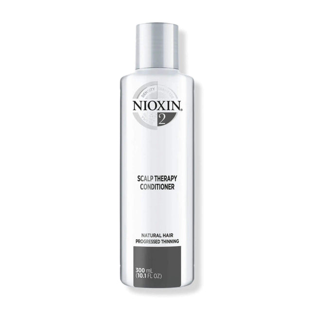 Nioxin System 2 Scalp Therapy Conditioner for fine, natural hair with progressed thinning, hydrates scalp and promotes thicker hair growth.