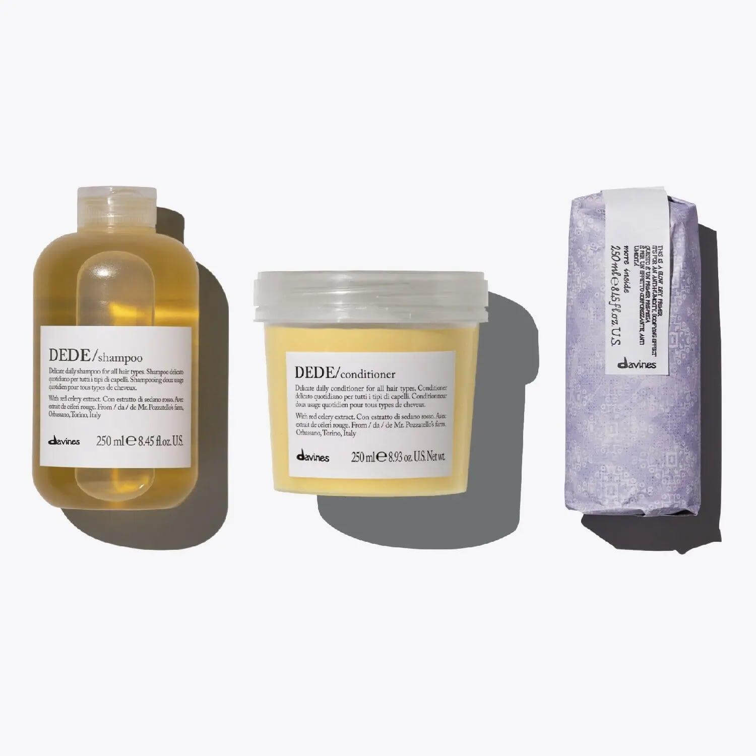 The Daily Essentials Set with DEDE Shampoo and Conditioner for perfect blowout, featuring Blow Dry Primer to enhance volume and protect hair.