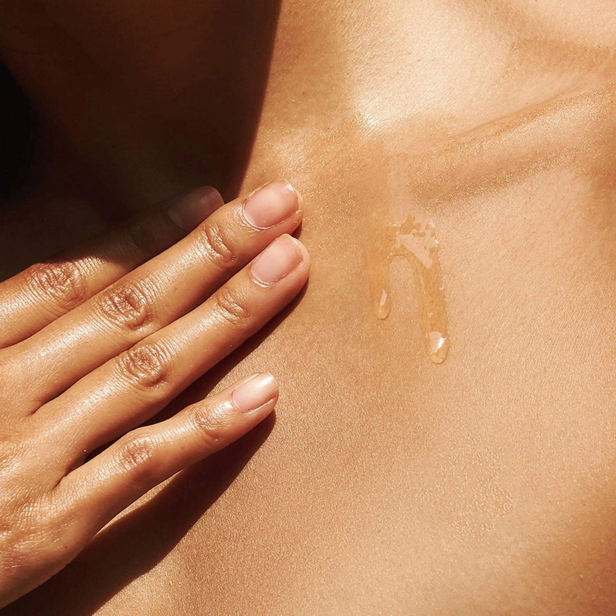 Applying The Oil blend on skin for revitalizing anti-aging benefits