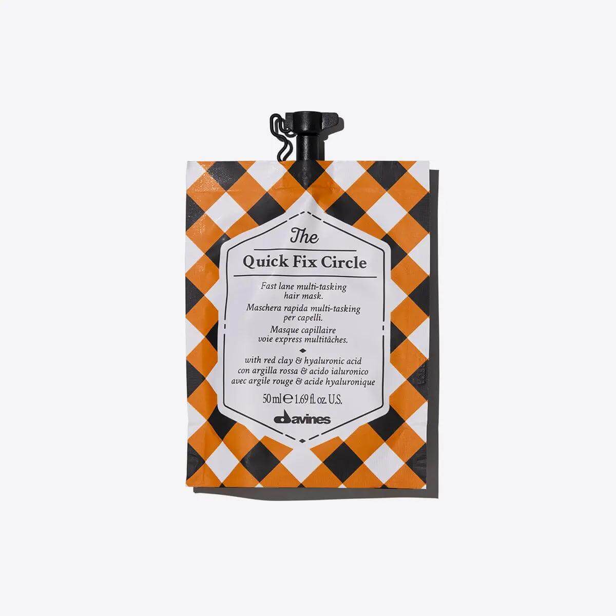 Davines Quick Fix Circle hair mask packaging with black and orange design, 50ml. Instant hydration and detangling for all hair types.