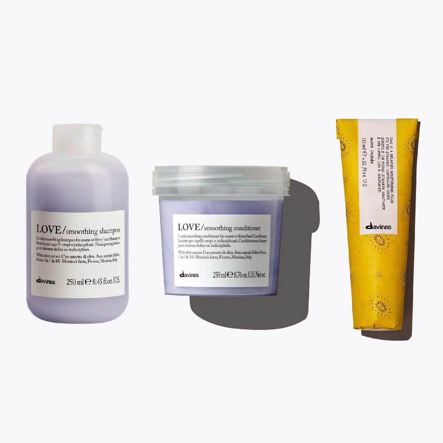 The Smooth Operator Set with Love Smooth Shampoo, Conditioner, and Relaxing Moisturizing Fluid for frizzy hair control.