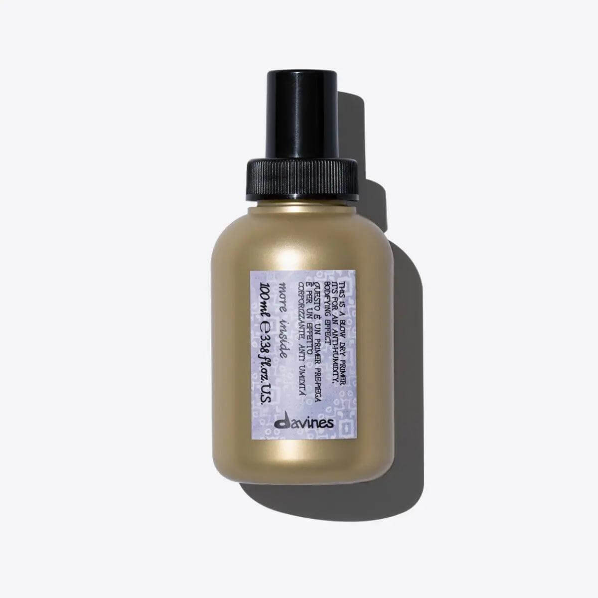 "Davines blow dry primer bottle for anti-humidity and shine with heat protectant benefits"