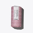 Pink floral-wrapped product labeled Davines, shot against a white background.
