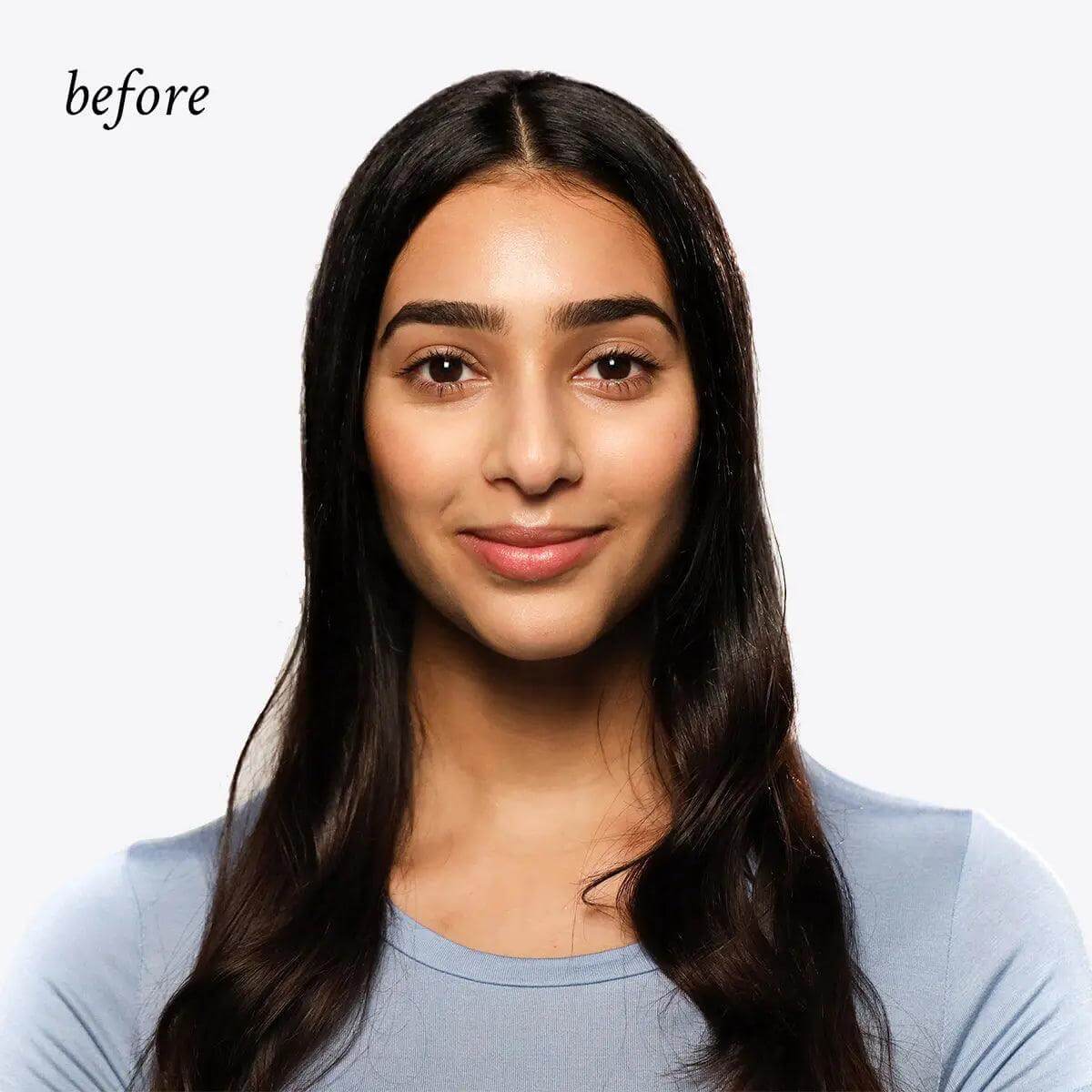 Woman with long hair in 'before' dry shampoo style test, showcasing natural hair before using invisible dry shampoo.