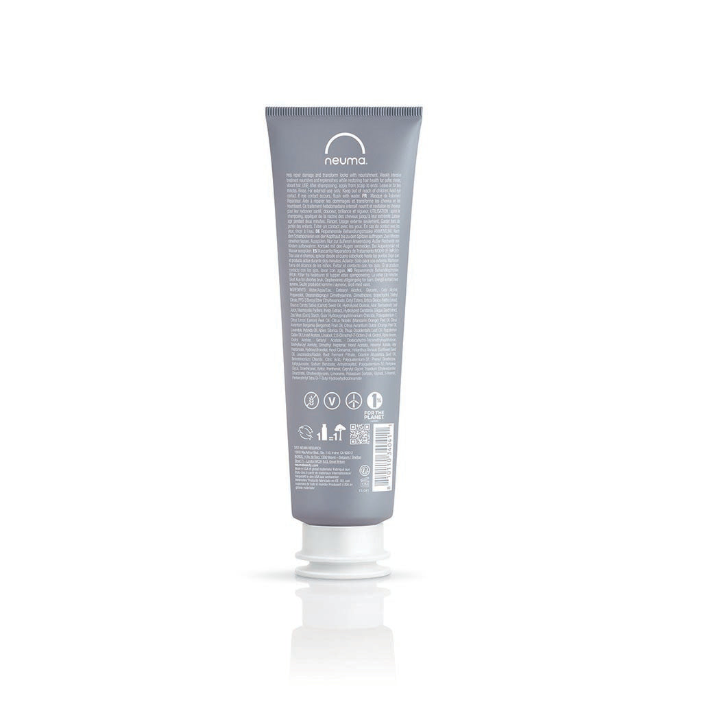 Neu Repair Treatment Masque tube for revitalizing and restoring damaged hair with nourishing infusion of lemon, lavender, and fir needle.