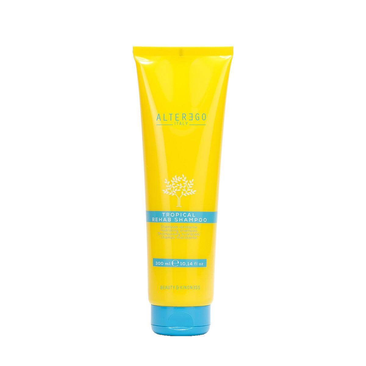 Bottle of Tropical Rehab Shampoo for post-sun hair care, eliminates salt and chlorine, deeply hydrates, leaving hair silky soft.