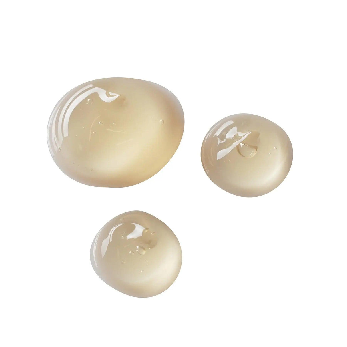 Close-up of Under Eye Gel with natural ingredients for reducing puffiness and dark circles, featuring drops of gel texture.