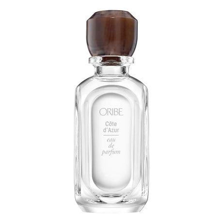 Valley Of Flowers Eau De Parfum bottle with notes of rose, jasmine, and amber. Luxurious scent in elegant packaging.