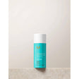 Moroccanoil Thickening Lotion bottle for volumizing fine hair with quinoa proteins and argan oil, 100ml size.