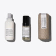 Voluminous Waves Set: LOVE CURL Primer, Liquid Spell, and styling product for defined, voluminous wavy hair care.