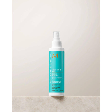 Volumizing Mist bottle for fine hair, boosts volume with argan oil and Dead Sea Salt, creating fuller, bouncy texture.