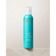 Moroccanoil Volumizing Mousse for instant volume and lift, enriched with argan oil, providing medium hold and anti-static properties.