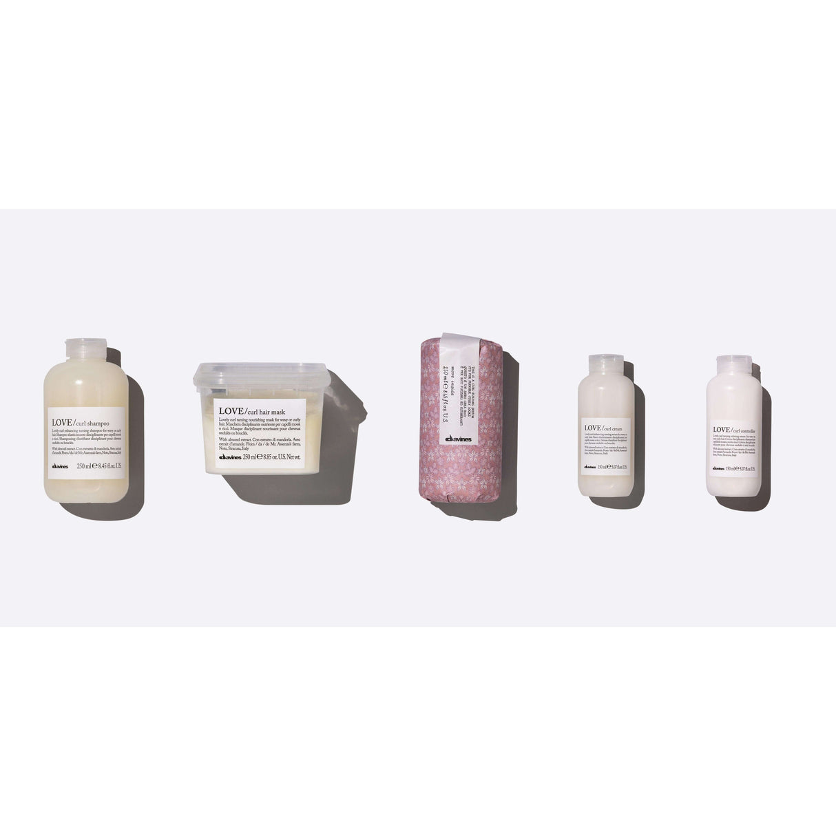 Wash & Go Curls Set with 5 products for effortless curls, including LOVE Curl Shampoo, Mask, Serum, Cream, and Controller.