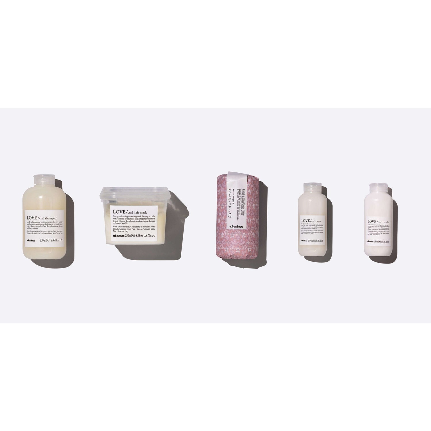 Wash & Go Curls Set with 5 products for effortless curls, including LOVE Curl Shampoo, Mask, Serum, Cream, and Controller.