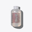 Davines gentle hair and body wash promoting regeneration and climate action, enriched with sustainable ingredients.