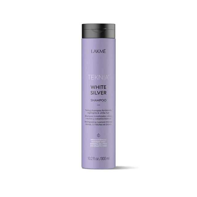 White Silver Shampoo bottle enhancing hair purity by neutralizing yellow tones; features citrus and floral fragrance with lotus extract.