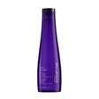 Yūbi Blonde Glow Revealing Shampoo bottle for brightening and minimizing brassiness in blonde hair.