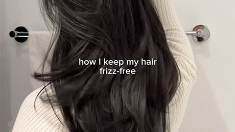 Person showing lustrous hair, text hints at frizz-free haircare tip.