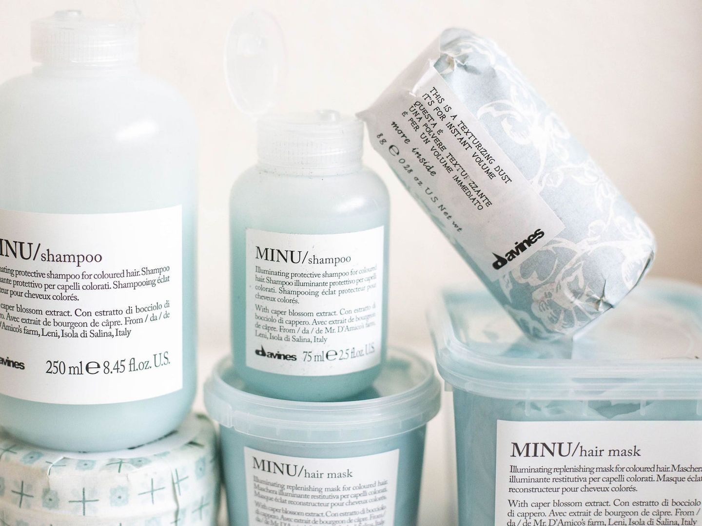 Haircare products, including shampoo and hair mask, arranged neatly.