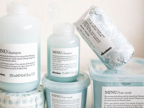 Haircare products, including shampoo and hair mask, arranged neatly.