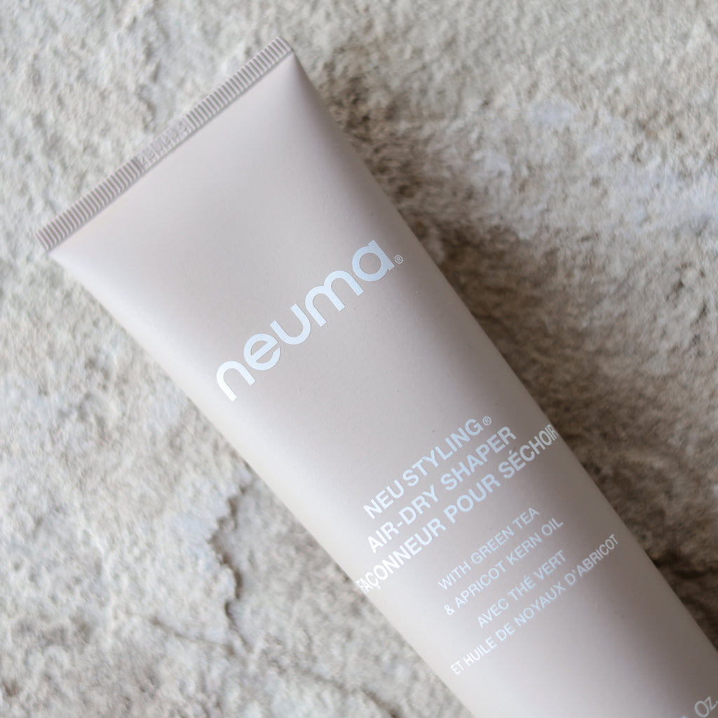 Neu Styling Air-dry Shaper tube, enhances natural texture, adds shine and control, with aromatic lavender, mandarin and vanilla.