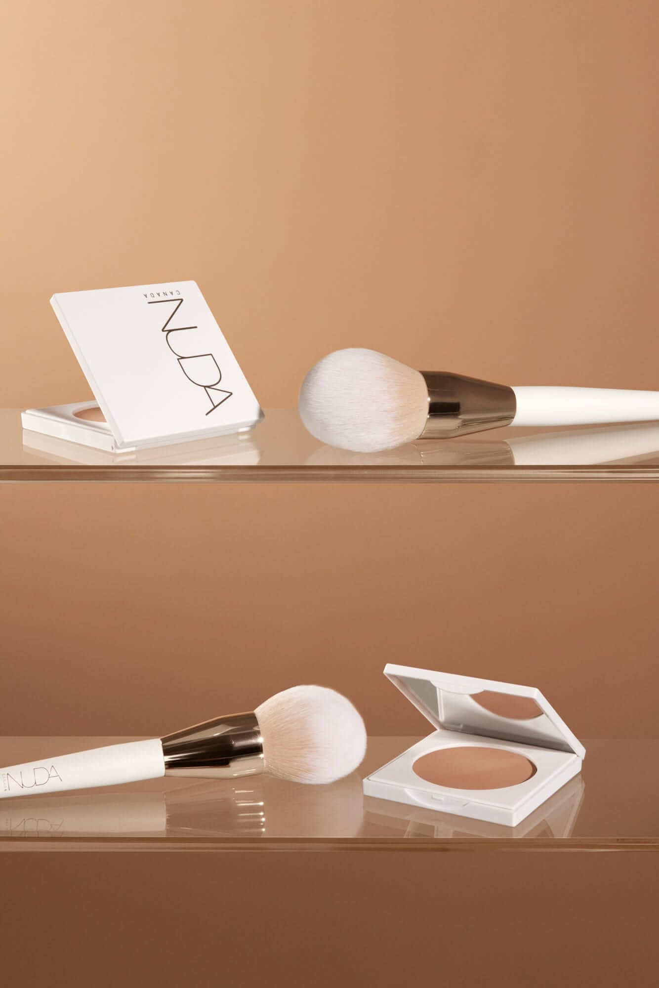 Deluxe Bronzed Kit with brush and matte bronzing powder for a radiant glow against a soft brown background