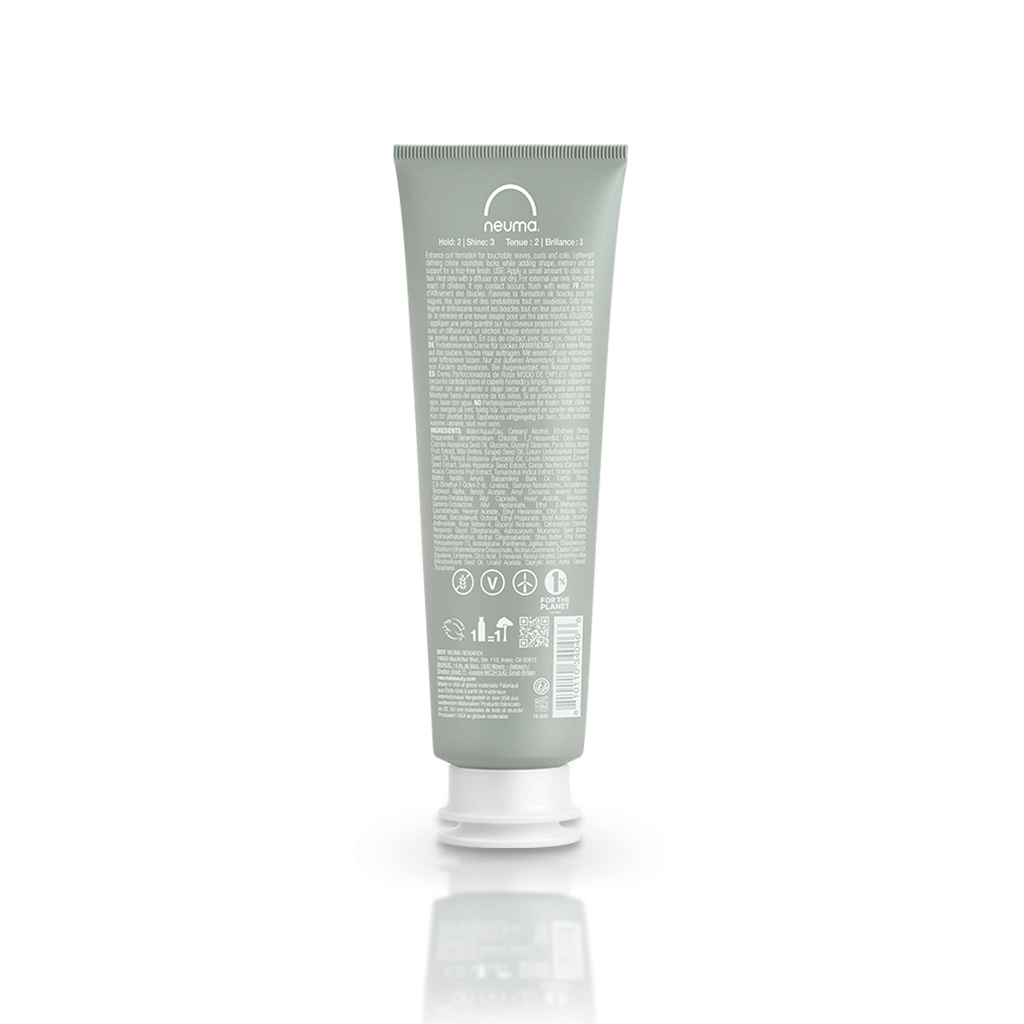 Neu Curl Perfecting Crème tube with coconut hibiscus scent for defining curls, minimizing frizz, and adding shine.