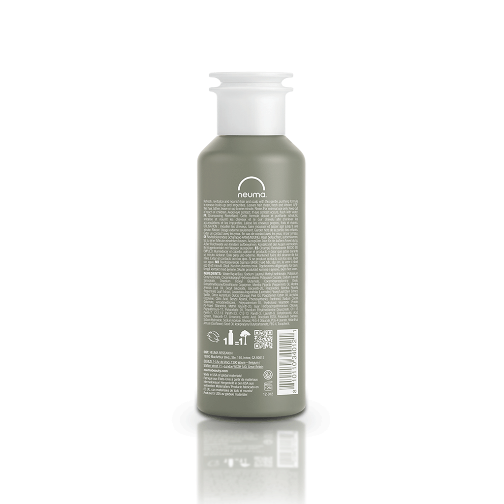 Bottle of Re Neu Clarifying Shampoo with gentle purifying formula in green packaging, sulfate-free, peppermint and vanilla aroma.