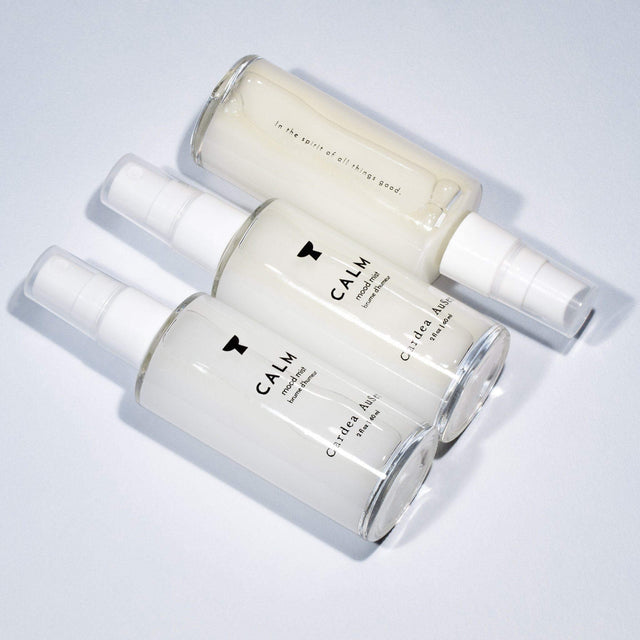 Alt Tag: Calm Mood Mist aromatherapy spray bottles for relaxation and meditation, featuring natural ingredients like lavender and bergamot.