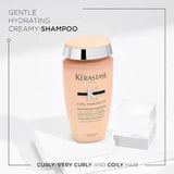 Curl Manifesto Bain Hydration Douceur sulfate-free shampoo for curly and coily hair, offers hydration and frizz control.