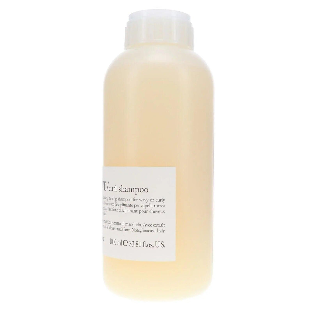 Davines Love Curl Shampoo 1L bottle for wavy or curly hair, enhances elasticity, volume, and shine, curly girl approved.