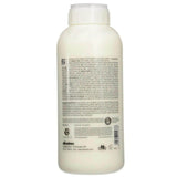 Back view of Davines Love Curl Enhancing Shampoo 1L bottle showcasing product details and ingredients for curly or wavy hair.