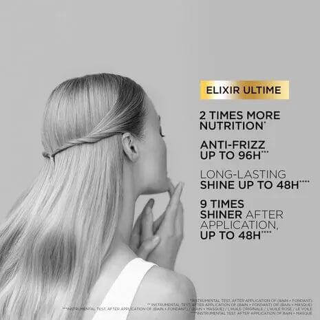 Woman applying Kerastase Elixir Ultime Hair Oil with benefits: 2x nutrition, anti-frizz, long-lasting shine for color-treated hair.