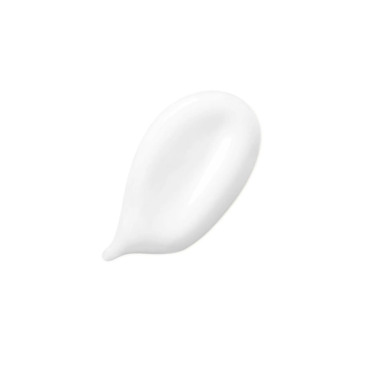 Texture of Kerastase Fondant Fluidéaliste Smoothing Conditioner for frizzy hair on white background.