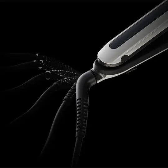L'Oréal Professionnel Steampod 3.0 hair straightener featuring innovative steam technology for smoother, damage-free styling.