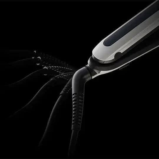 L'Oréal Professionnel Steampod 3.0 hair straightener showcasing its flexible design for smooth and effortless styling.