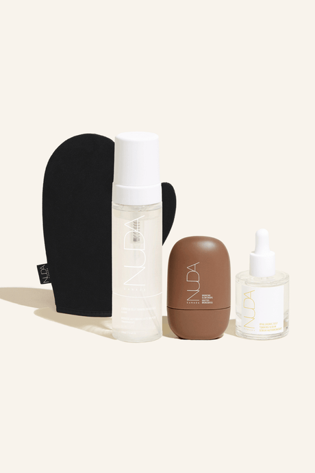 Ultimate Glow Kit featuring self tanning mousse, tanning mitt, facial self tanners, and glow drops for a radiant, bronzed look.