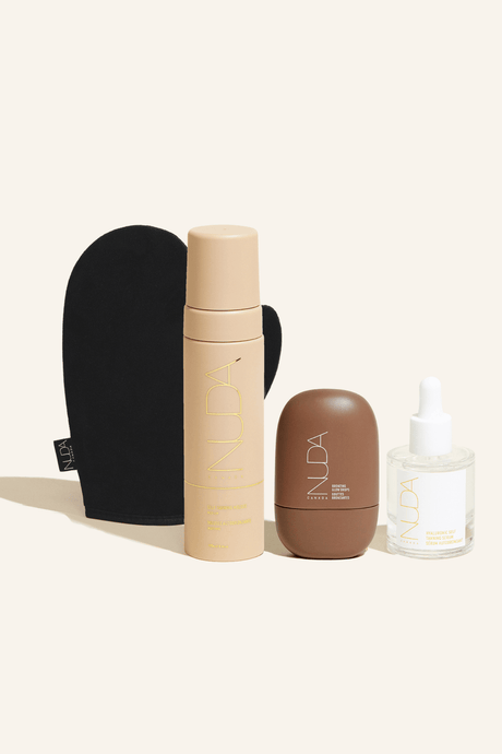 Ultimate Glow Kit including Self Tanning Mousse, Tanning Mitt, facial tanner, and choice of Body Shimmer or Bronzing Glow Drops.
