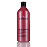 Bottle of Pureology Smooth Perfection Shampoo for color-treated hair with violet, clove, and musk scent, 33.8 fl oz size.