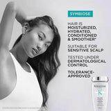 Kerastase Symbiose Bain Crème Apaisant, a gentle shampoo for sensitive scalp, moisturizing and smoothing hair, with a female model.